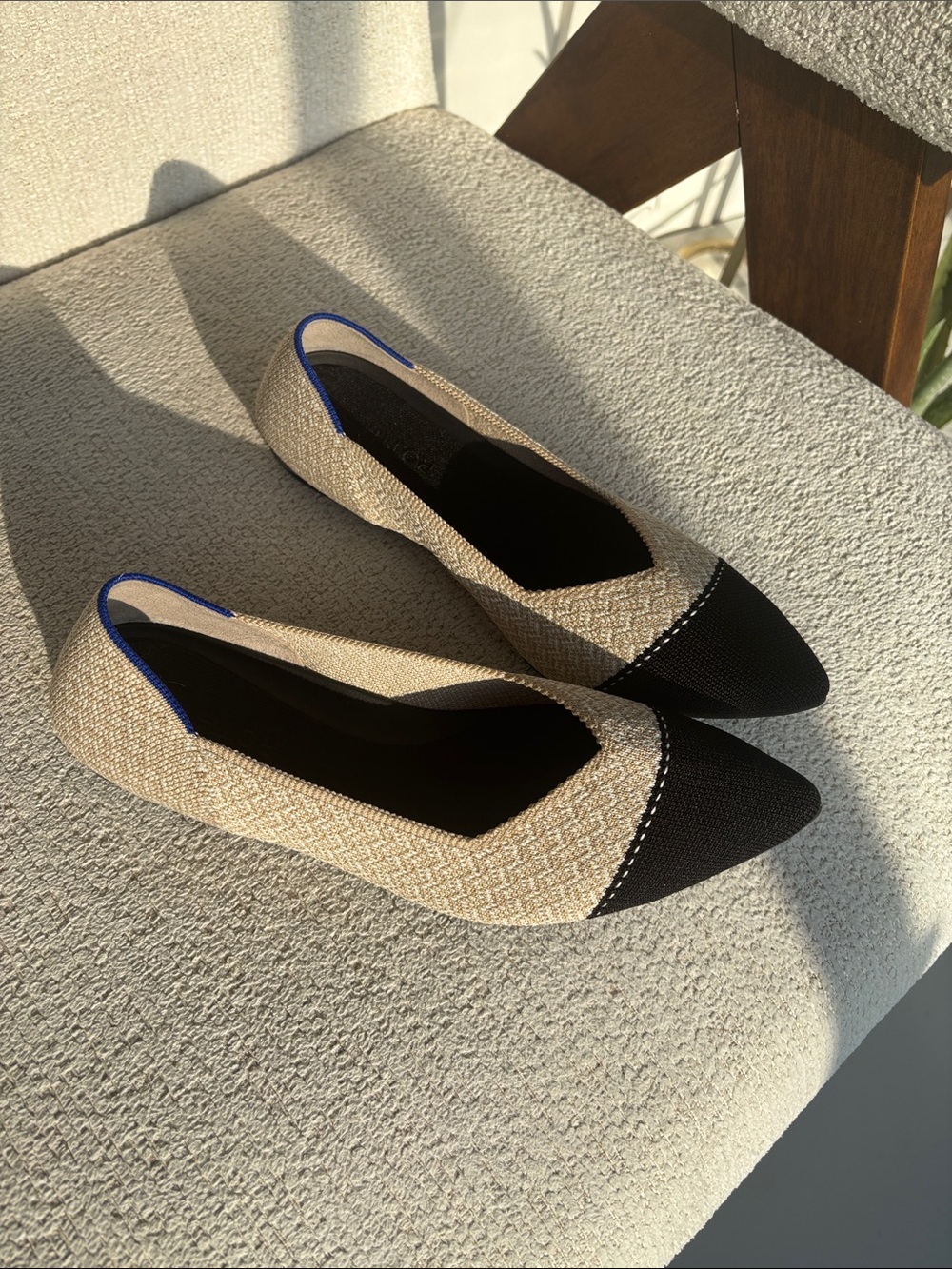 Rothy's Beige Flats with Black Pointed Toe and Blue Trim